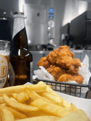 Chicken wings fries and beer