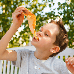 Kid Eating Pizza 